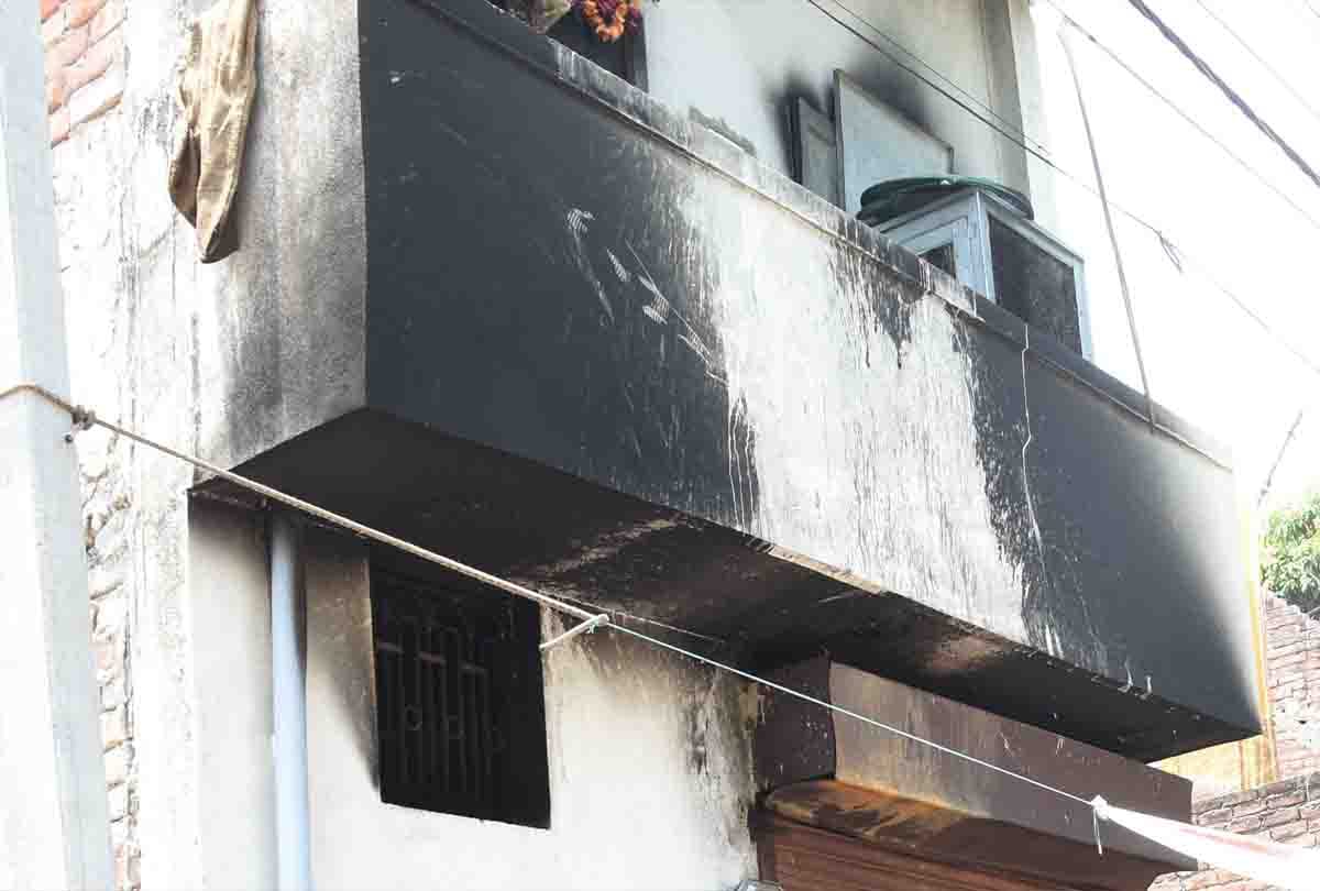 Four people burned in fire in house