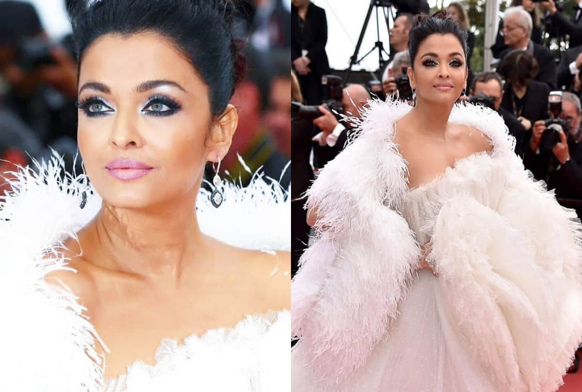 aishwarya rai bachchan royal look in white gown at cannes film festival day 2