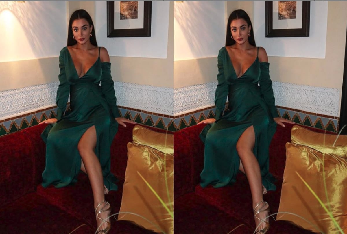 Amy Jackson flaunts her baby bump in sizzling green gown