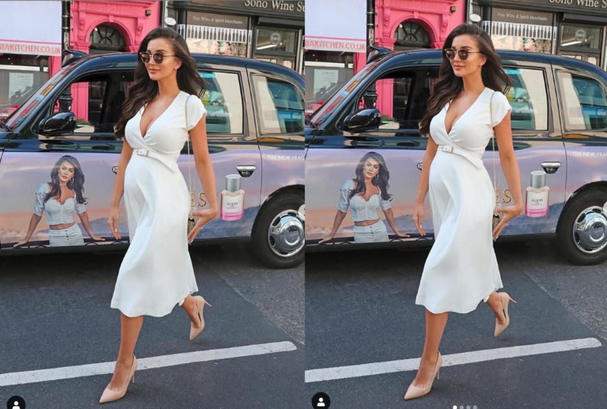 Amy Jackson flaunts her baby bump in sizzling green gown