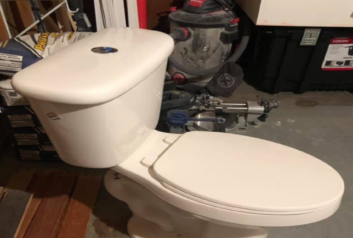 why toilet flush has two buttons one large and one small