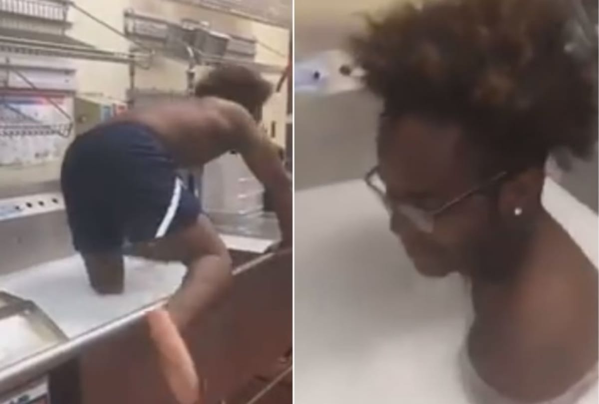 employee take bath in kitchen sink viral video