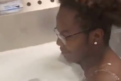 employee take bath in kitchen sink viral video