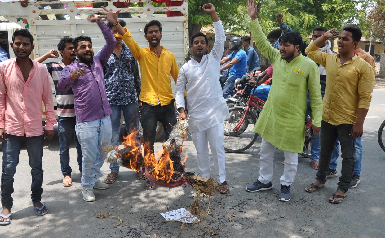 Students burn effigy of Public Service Commission
