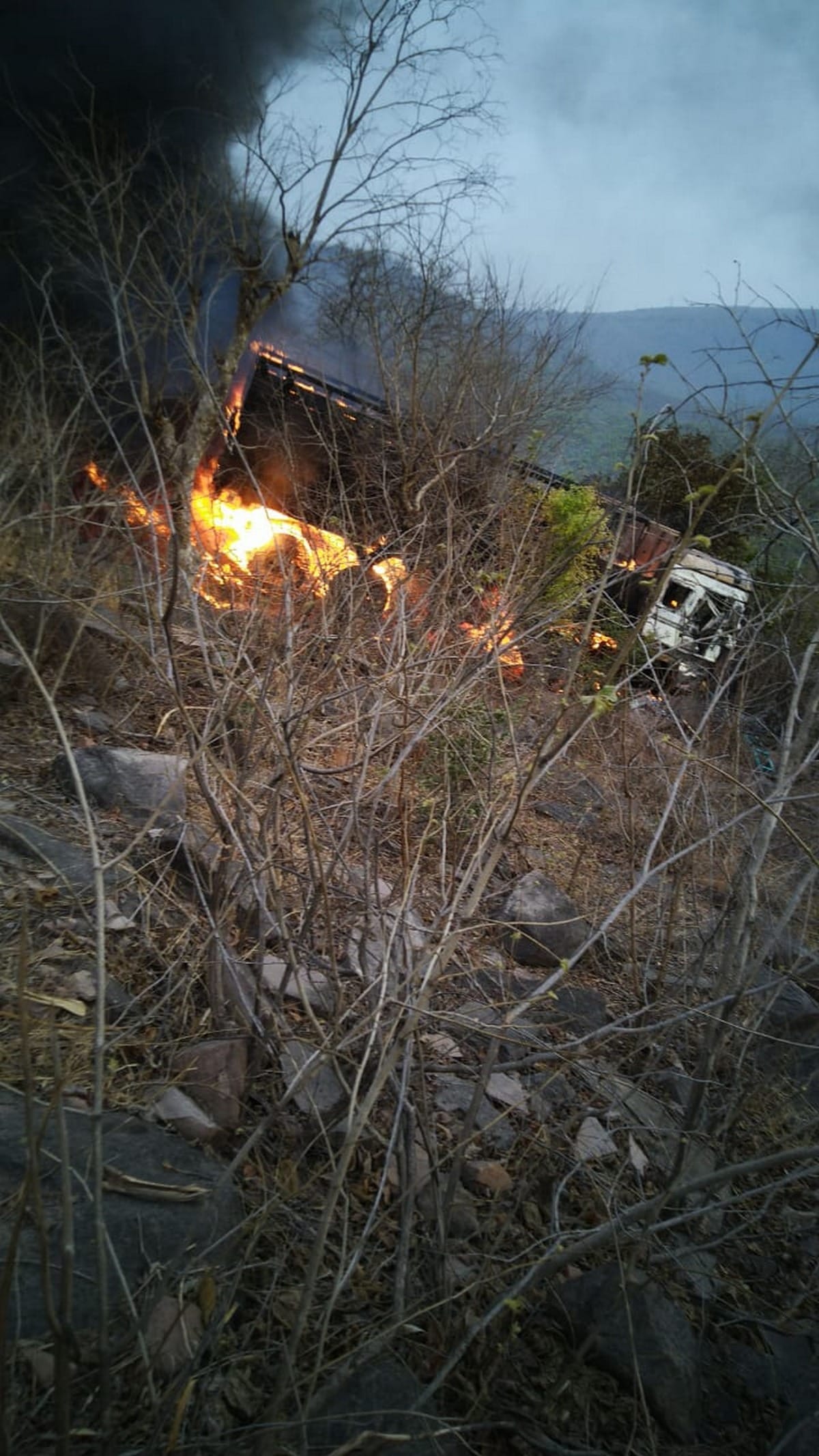 fire broke out in truck after falling into a deep ditch
