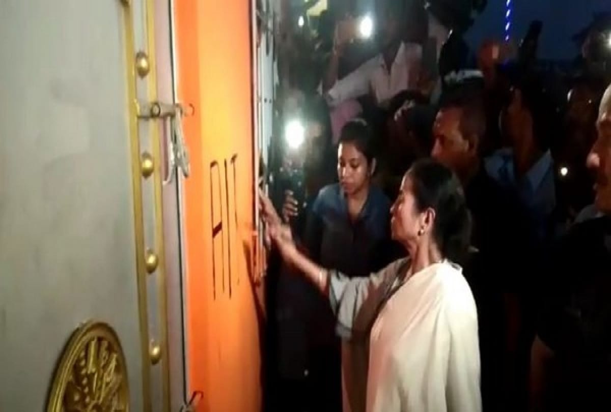 West Bengal CM Mamata Banerjee draws TMC symbol after erasing BJPs Kamal in party office