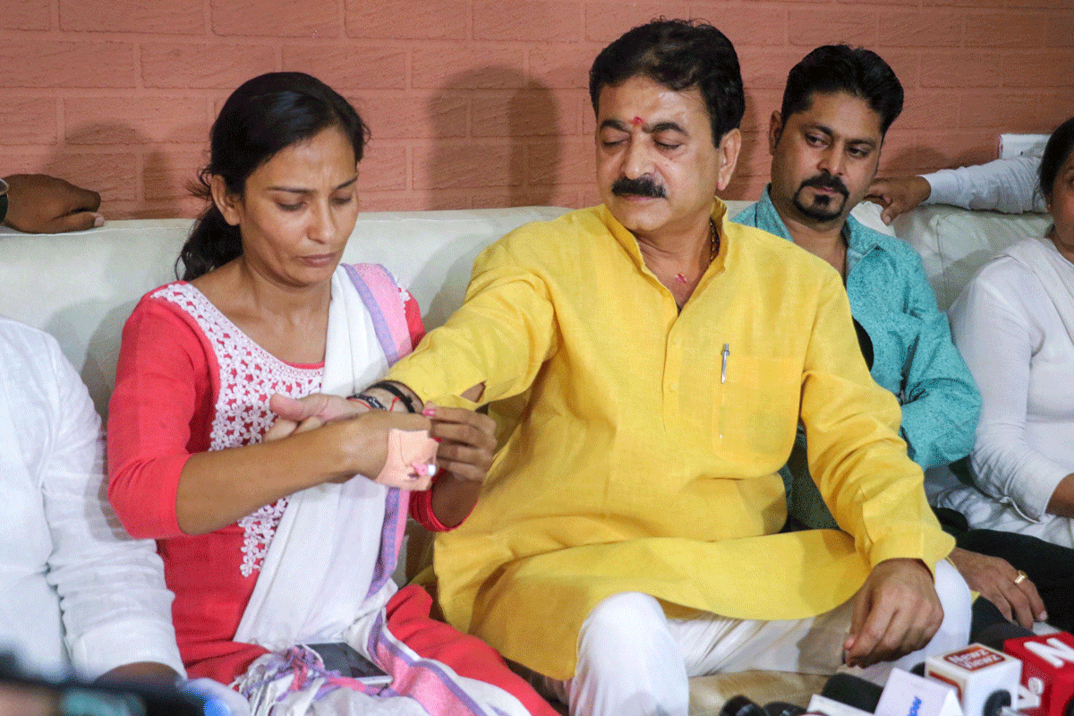 BJP MLA become brother after thrash woman leader of NCP