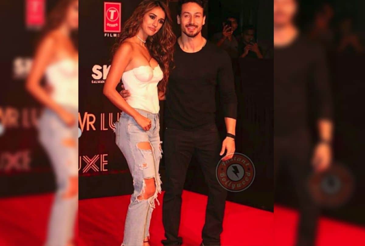 disha patani with tiger shroff pose during bharat movie premiere