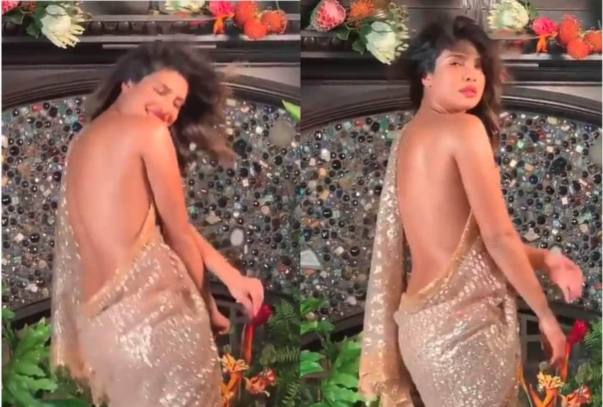 Priyanka Chopra sizzles in golden saari by flaunting her back