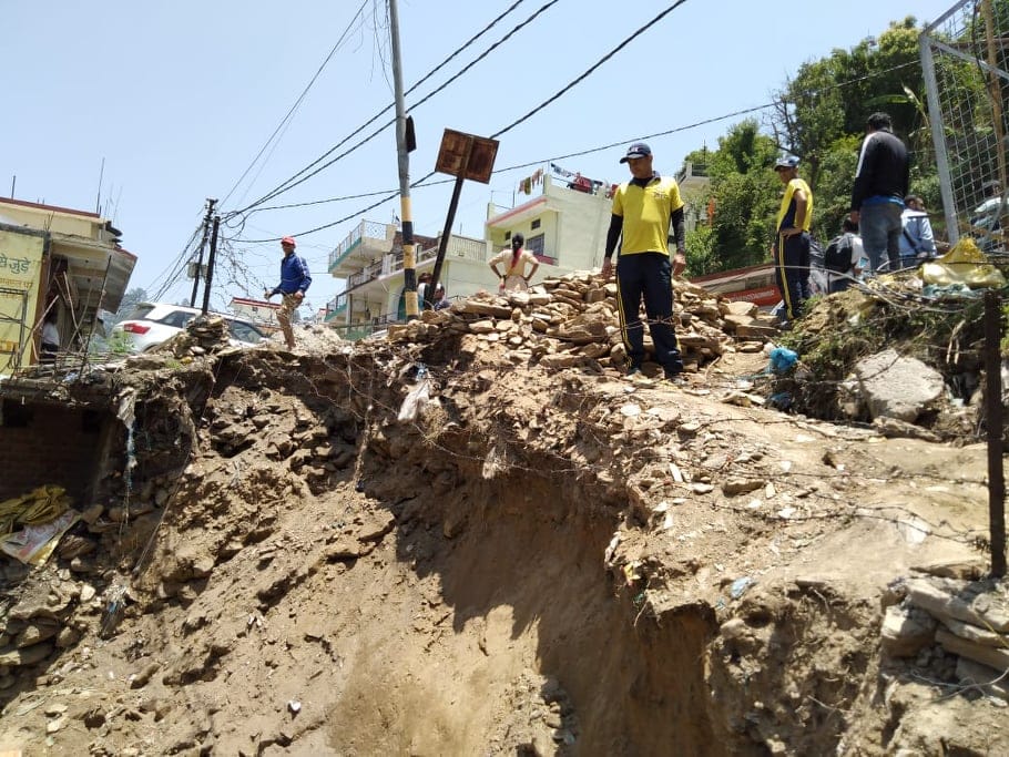 Almora mall road collapse Labourer buried under debris 