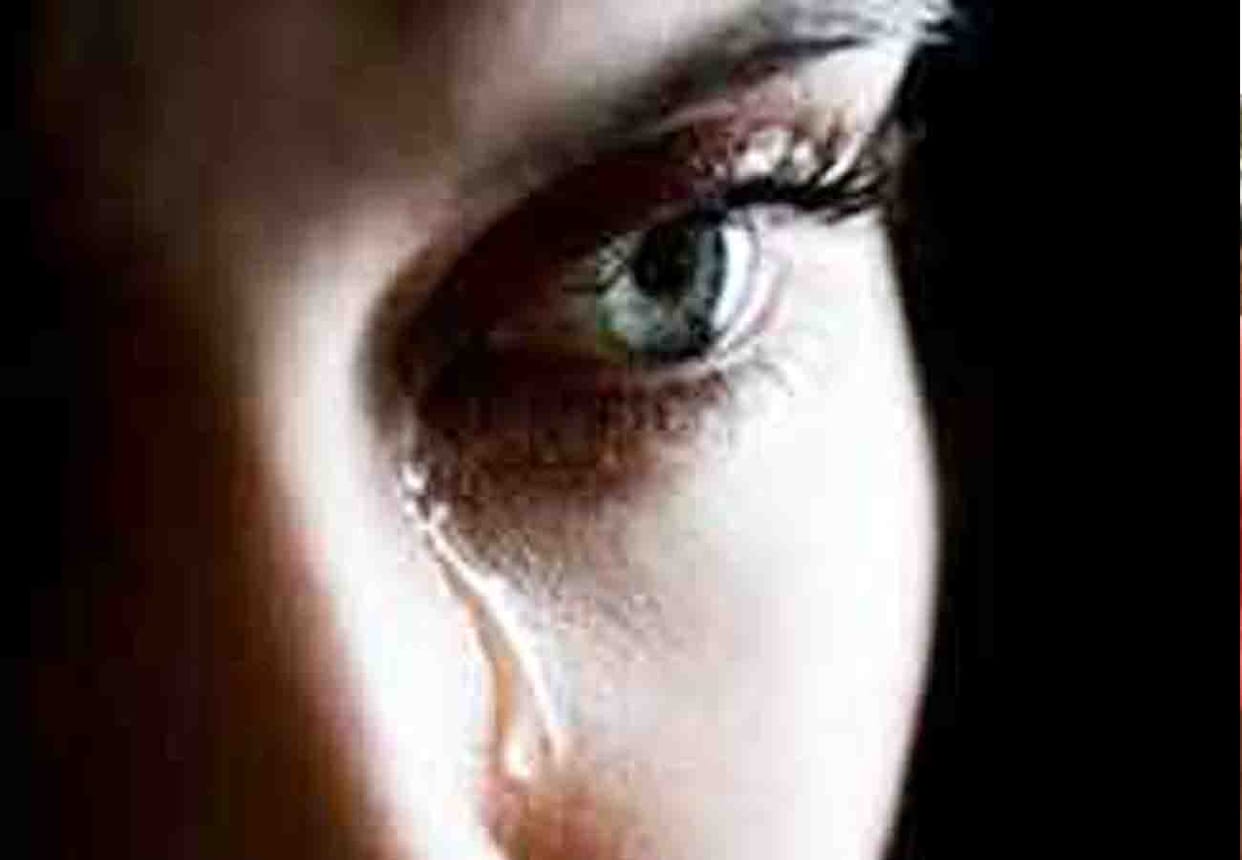 Threat to girl of pasting posters on walls
