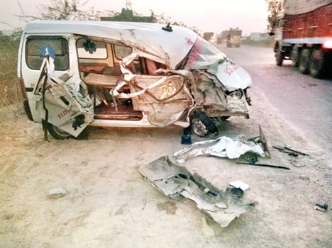 Ambulance collides with truck, woman's death