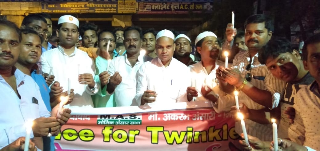 अलीगढ़ में मासूम की हत्या के विरोध में कैंडल मार्च