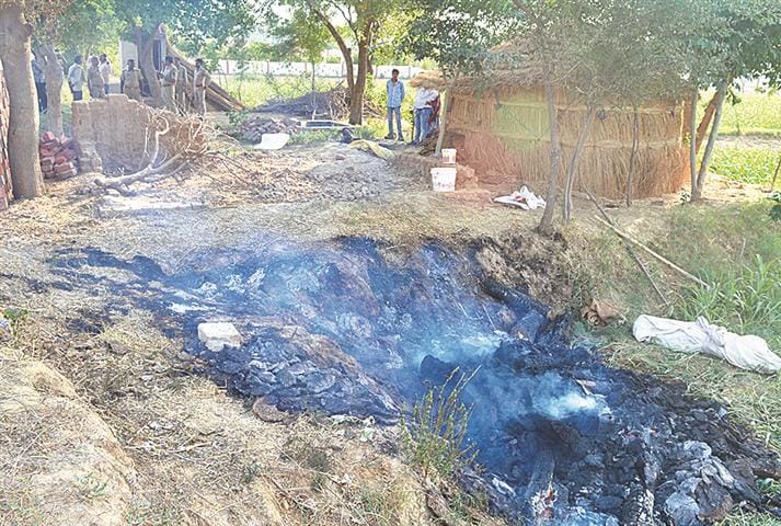 Police detained the burning pyre man's burnt body