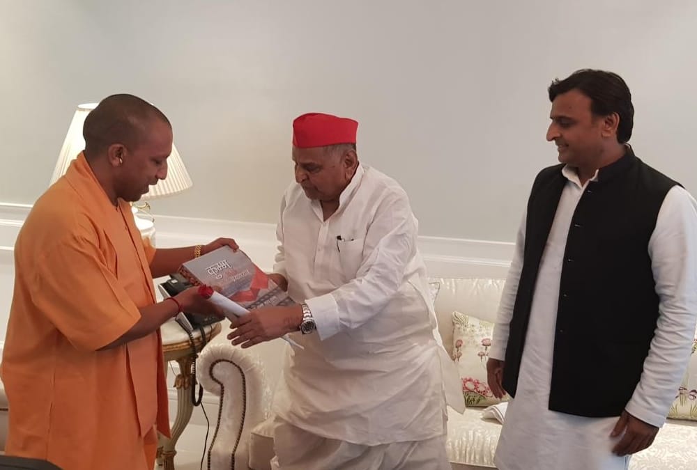 CM Yogi Adityanath meets Mulayam Singh Yadav in his home.