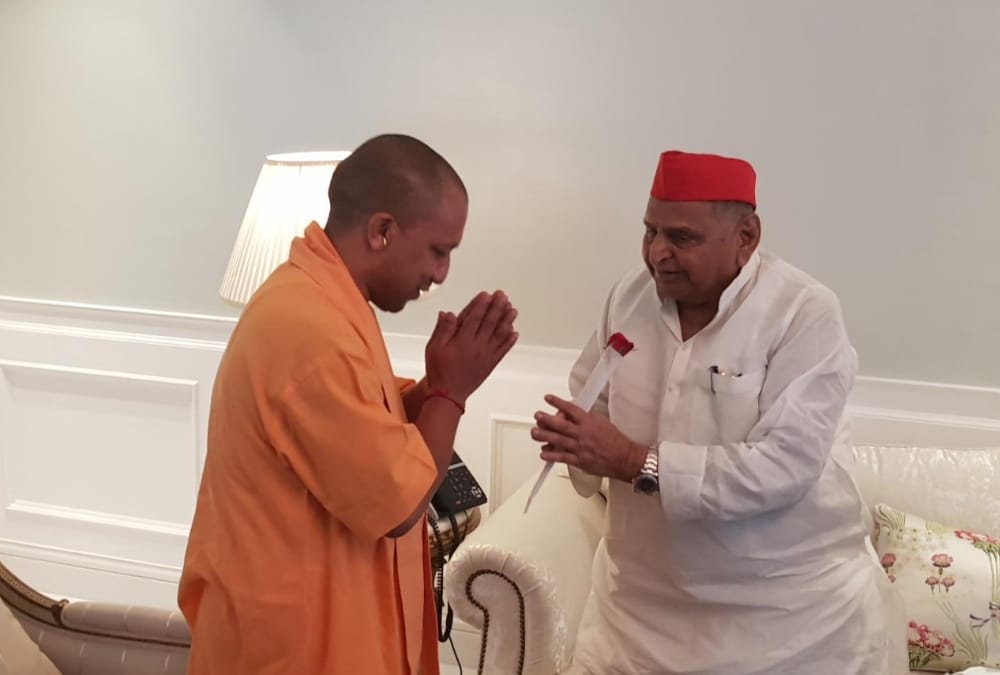 CM Yogi Adityanath meets Mulayam Singh Yadav in his home.