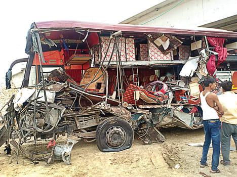 Bus collides with truck on expressway, two killed, 15 wounded