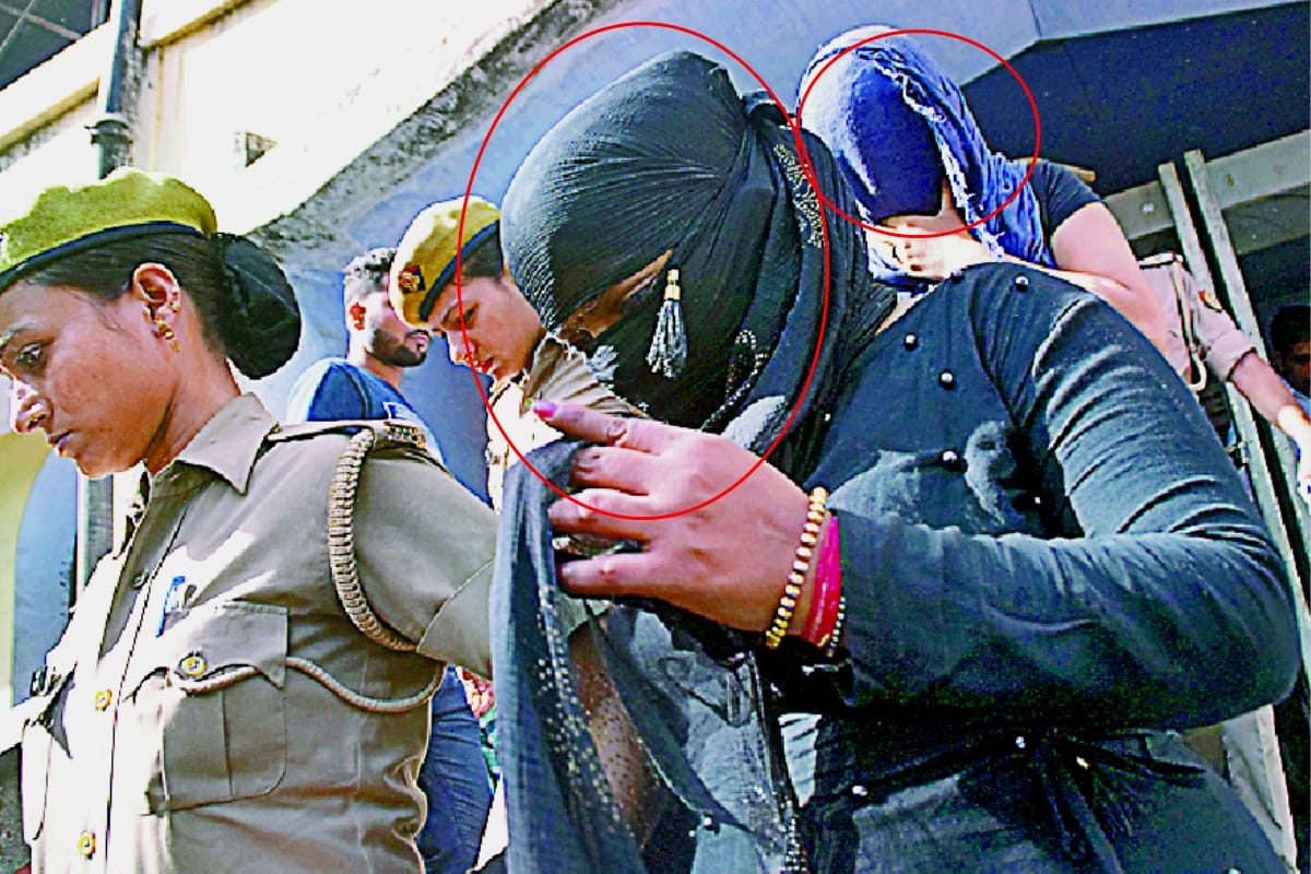inspector and two women arrested for extorting money from commuters by threatening rape case