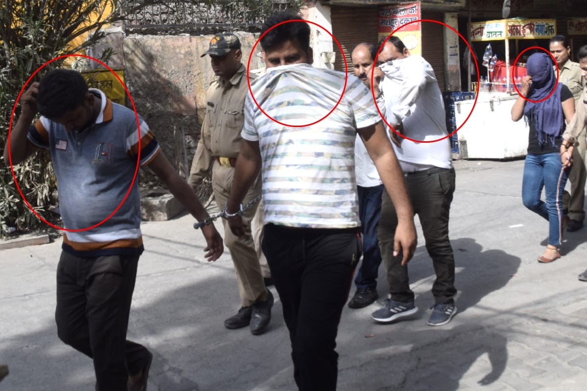 inspector and two women arrested for extorting money from commuters by threatening rape case