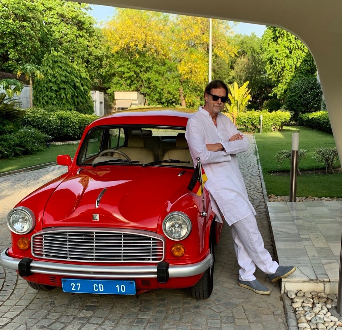 german ambassador to india walter j lindner organised a contest, Spot His Red Amby and Win miniature