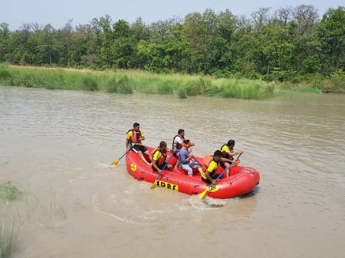 Young man bathing on Ganga Dussehra immersed in river