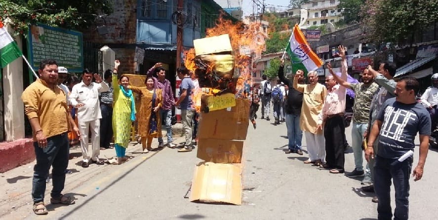Congressmen blow the effigy of MLA champion