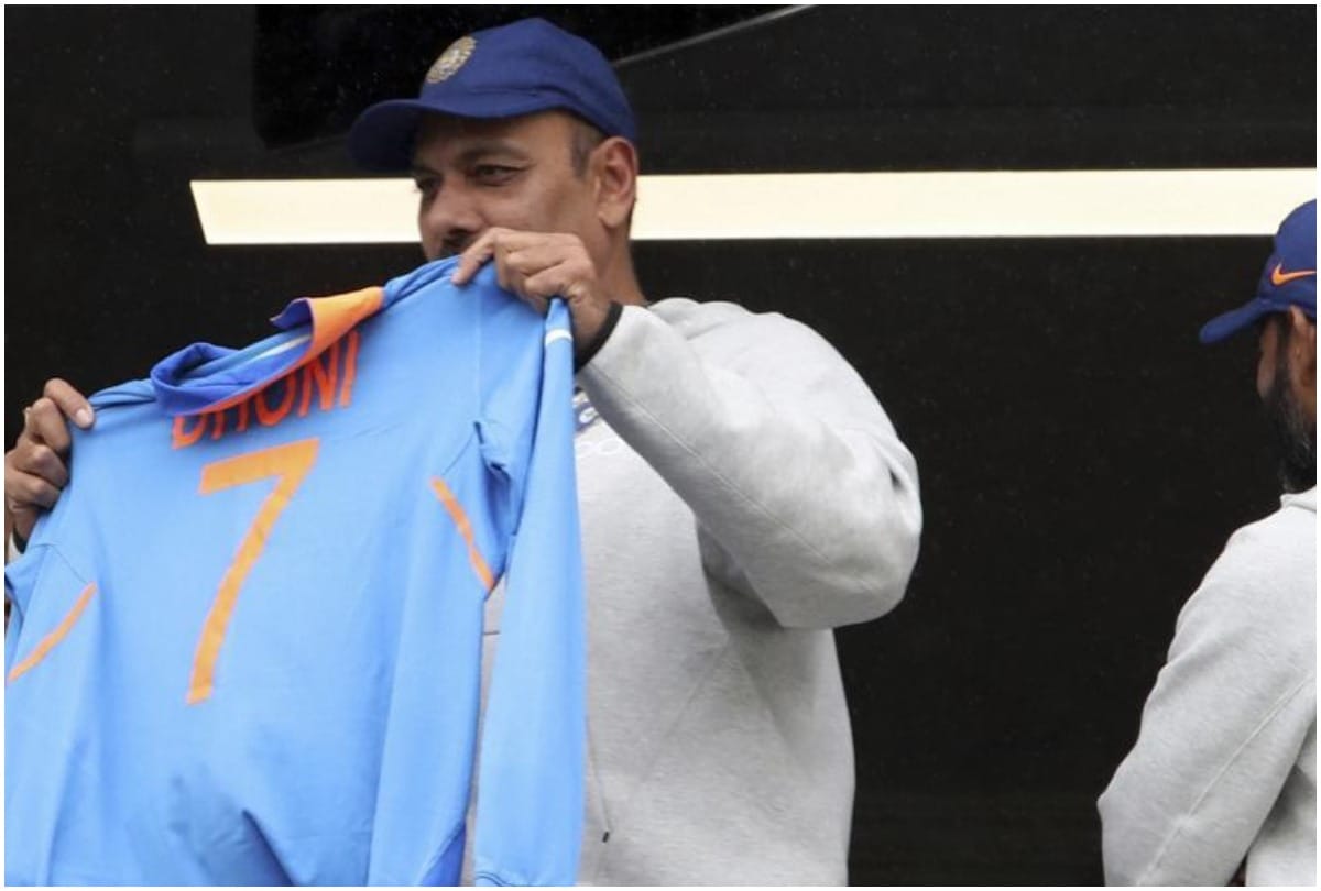 World Cup 2019: Ravi Shastri holds aloft MS Dhoni jersey from the Indian dressing room balcony