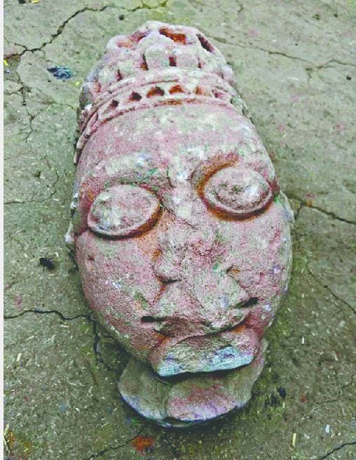 खोदाई में निकला गौतम बुद्ध की मूर्ति का सिर
