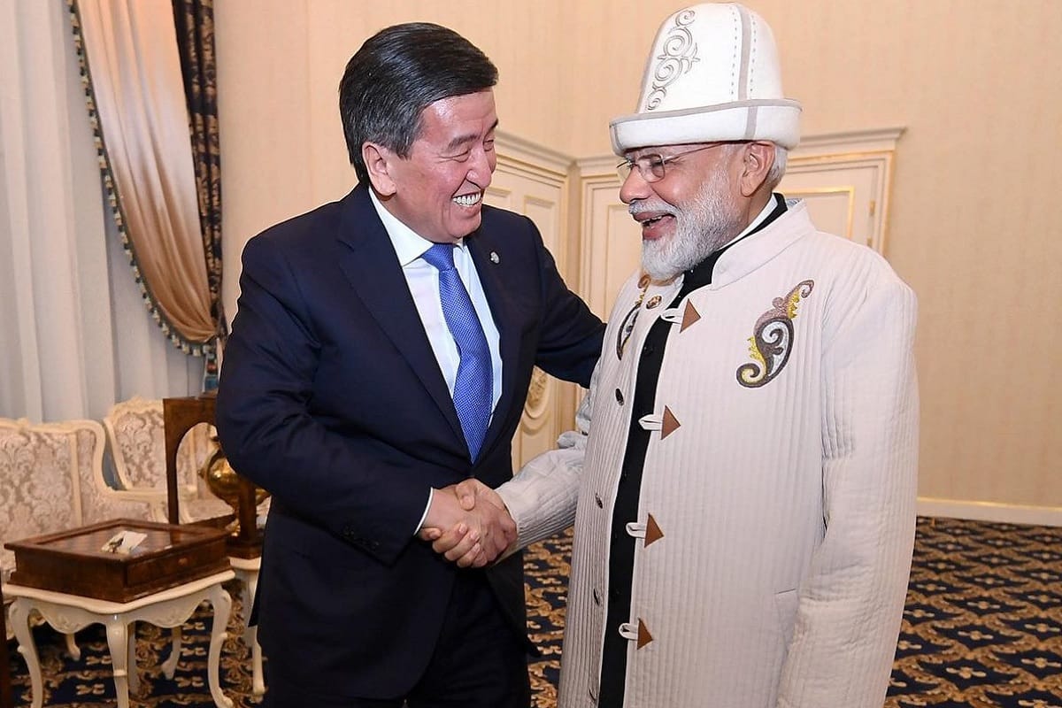 President of Kyrgyzstan Sooronbay Jeenbekov gifted traditional can and coat to PM Narendra Modi