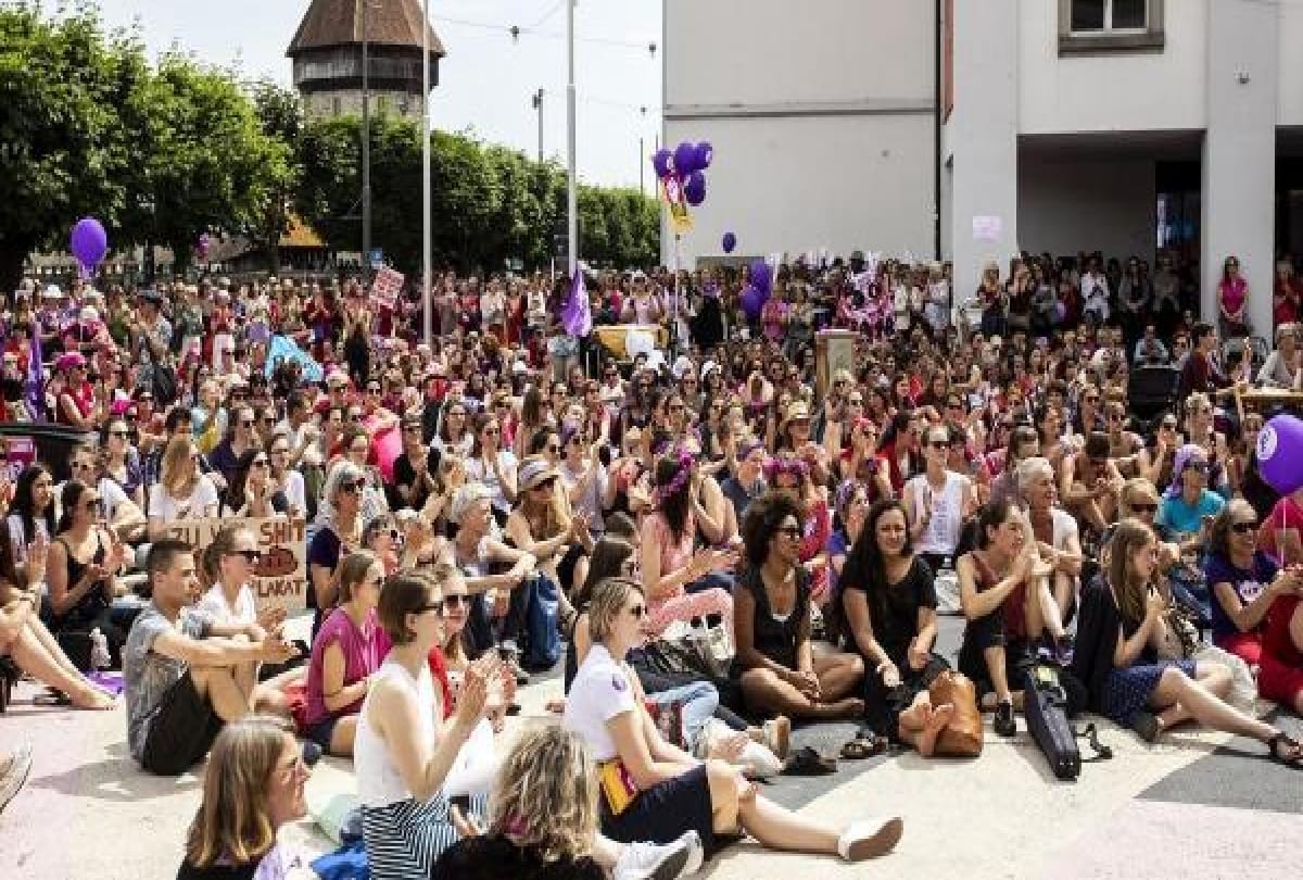 purple wave in switzerland women burn innerware during protest