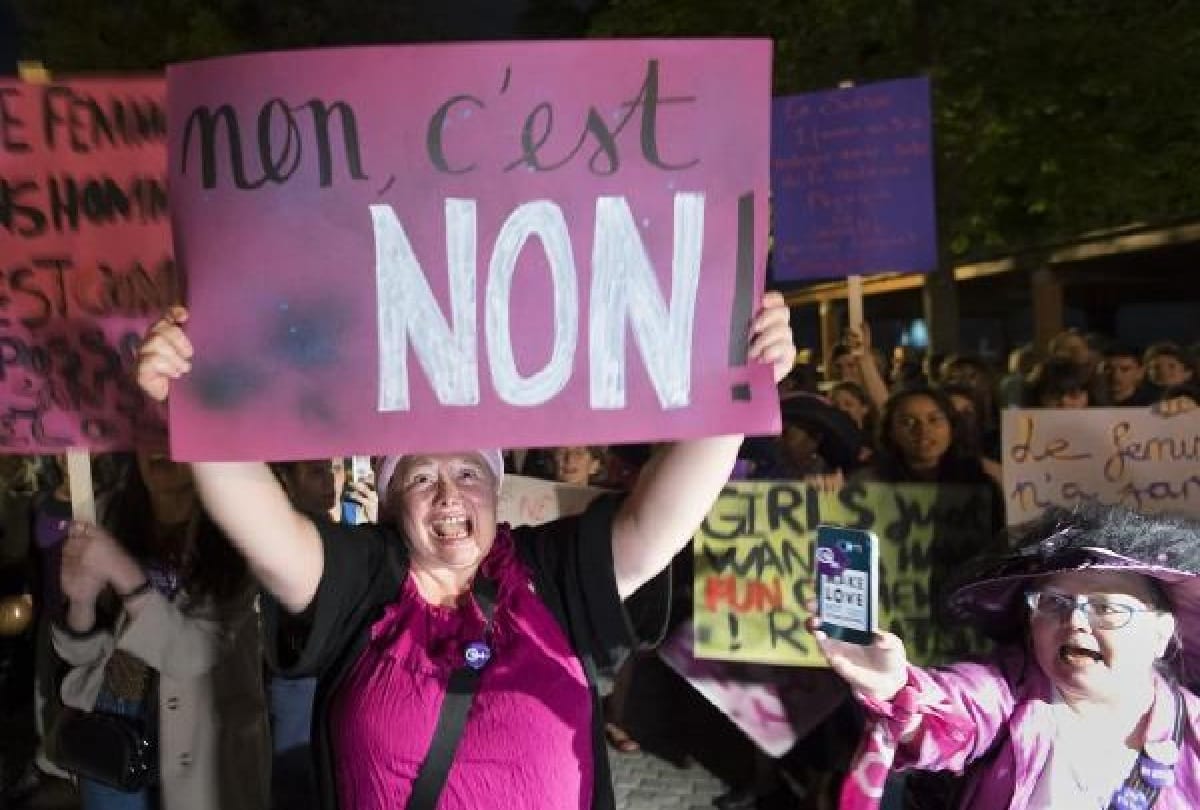 purple wave in switzerland women burn innerware during protest