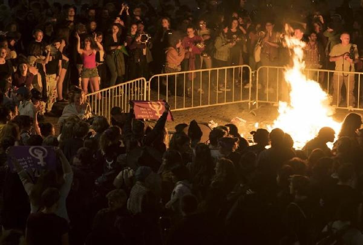 purple wave in switzerland women burn innerware during protest
