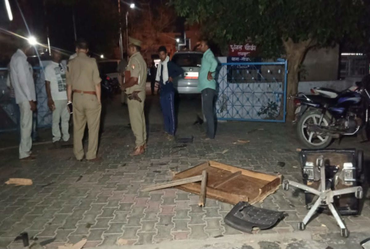 angry mob attacks police station after murder in man