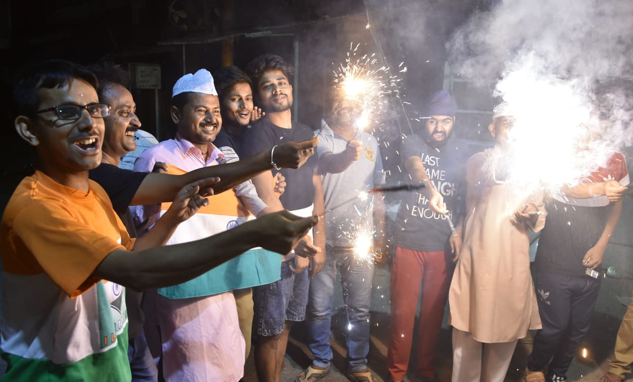 Fireworks on the streets, laddoos of happiness