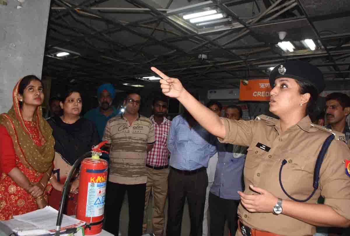 woman in police uniform with gun reached in bank