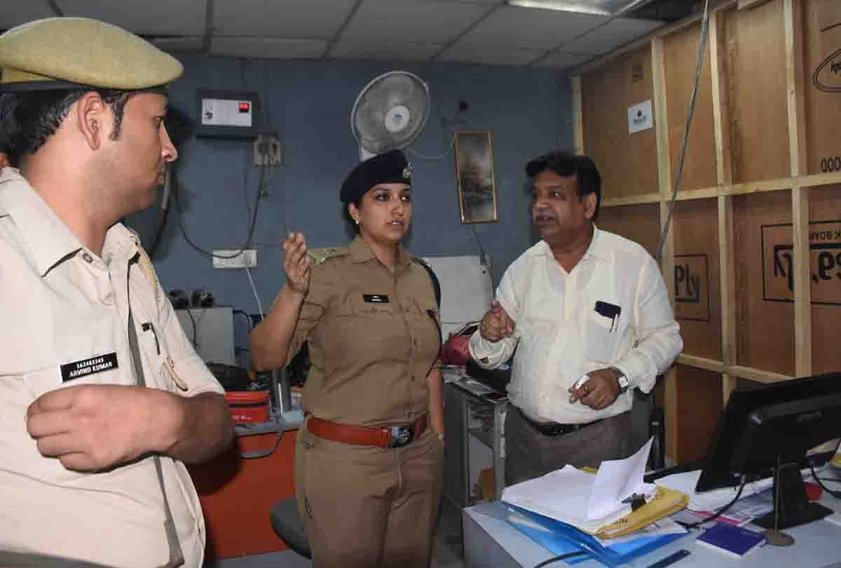 woman in police uniform with gun reached in bank