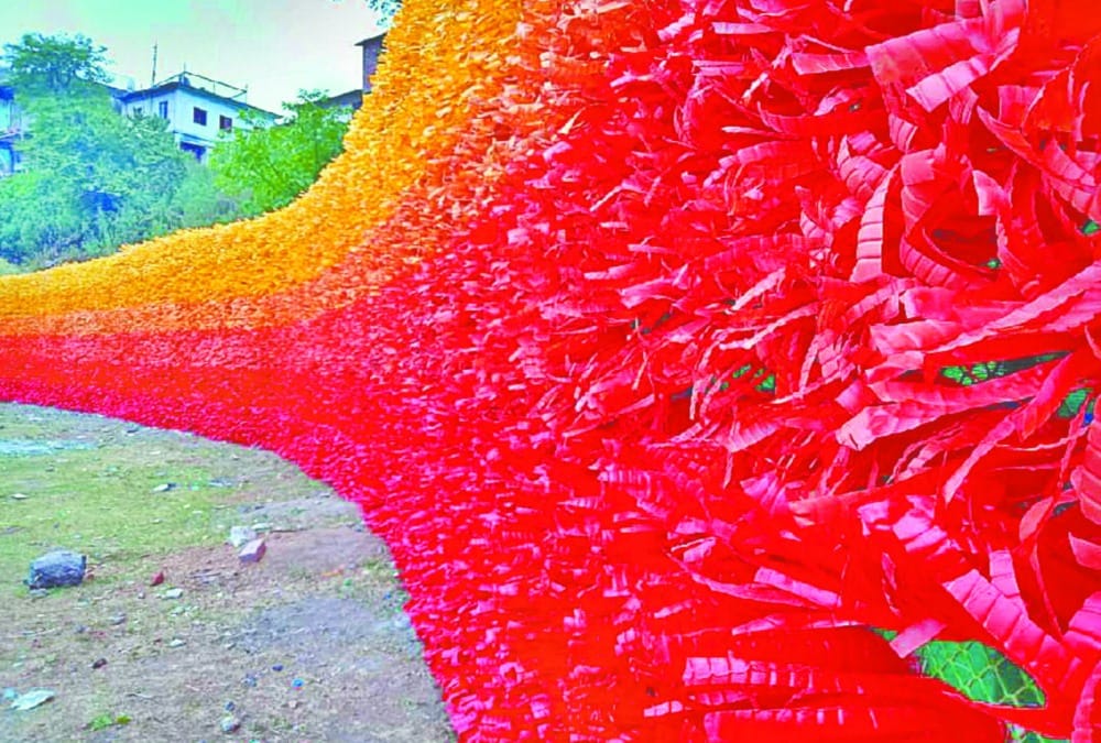 Beautiful wall of hope made by plastic bottles in kempty fall for control pollution