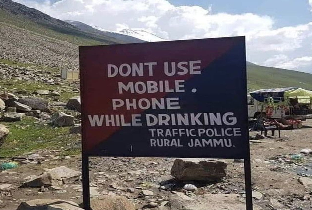 jammu traffic police shine board written do not use mobile while drinking