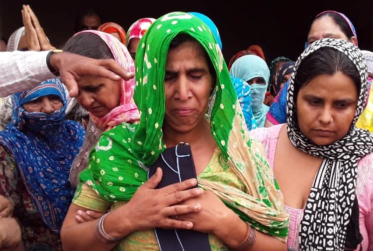 Last rites of Aircraftman Shaheed Pankaj Sangwan at Kohla village in Sonipat