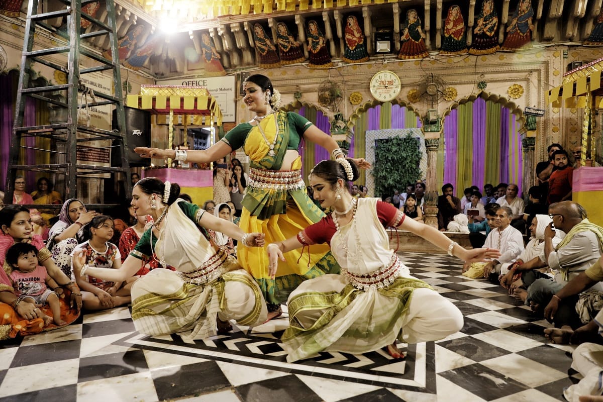 artist performs odyssey Dance in radharaman temple vrindavan