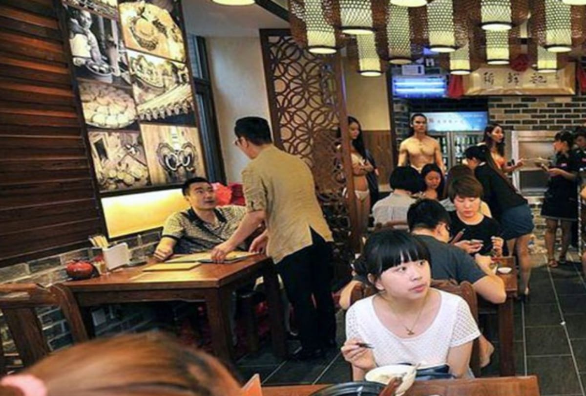 china restaurant female waiters serve food in bikni