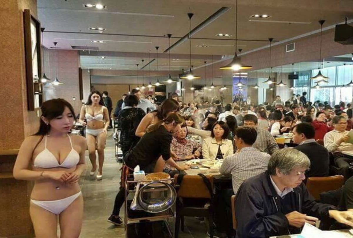 china restaurant female waiters serve food in bikni