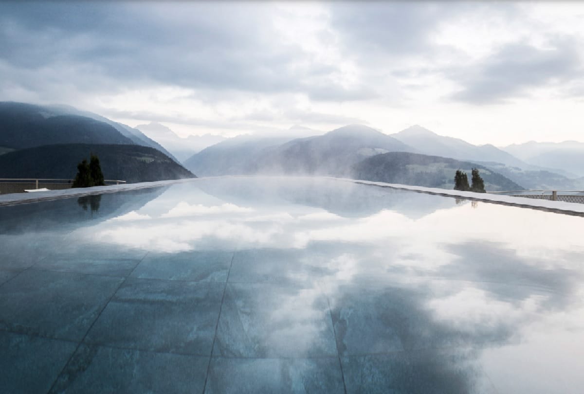 World's Most Dangerous Swimming Pool with glass bottom in hotel hubertus italy