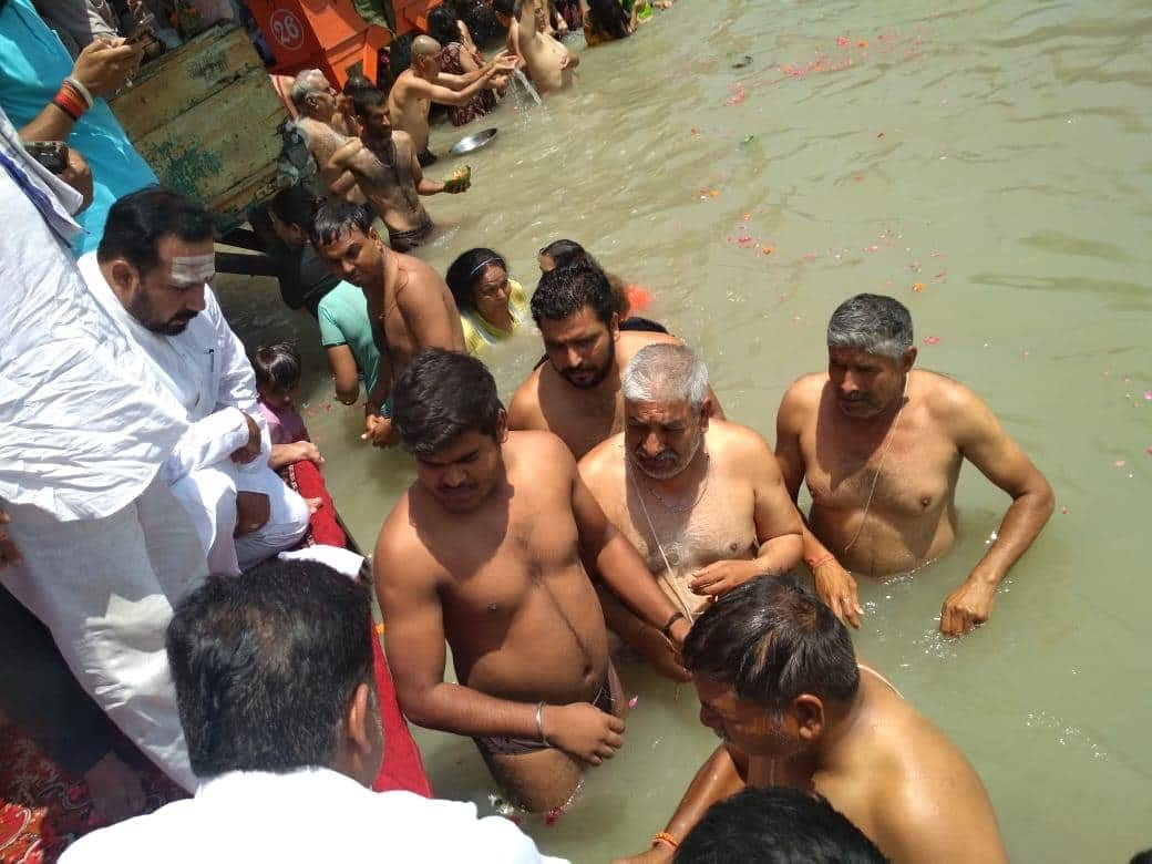uttarakhand education minister arvind pandey son ankur pandey bone immersed in ganga