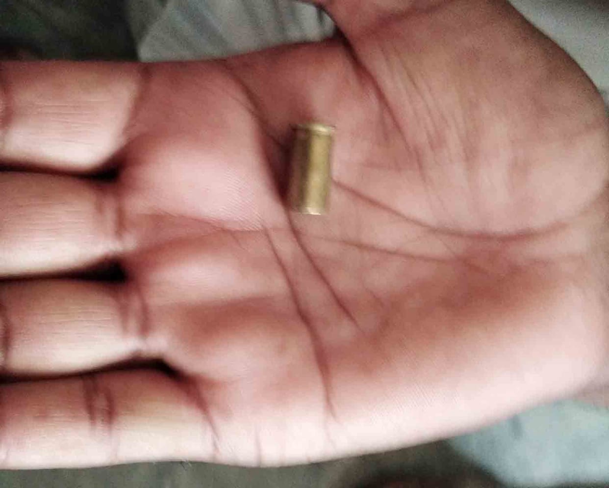 By phone, the accused said, the accidental shot