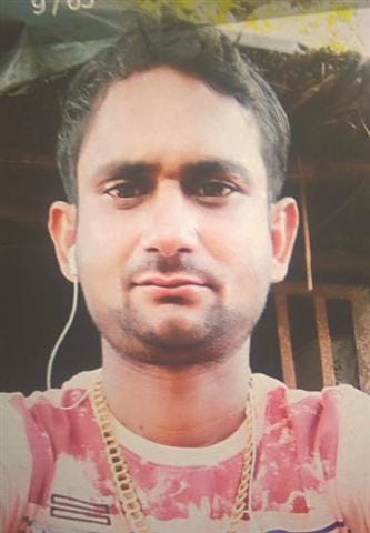 Suicide by shooting a youth in a garden