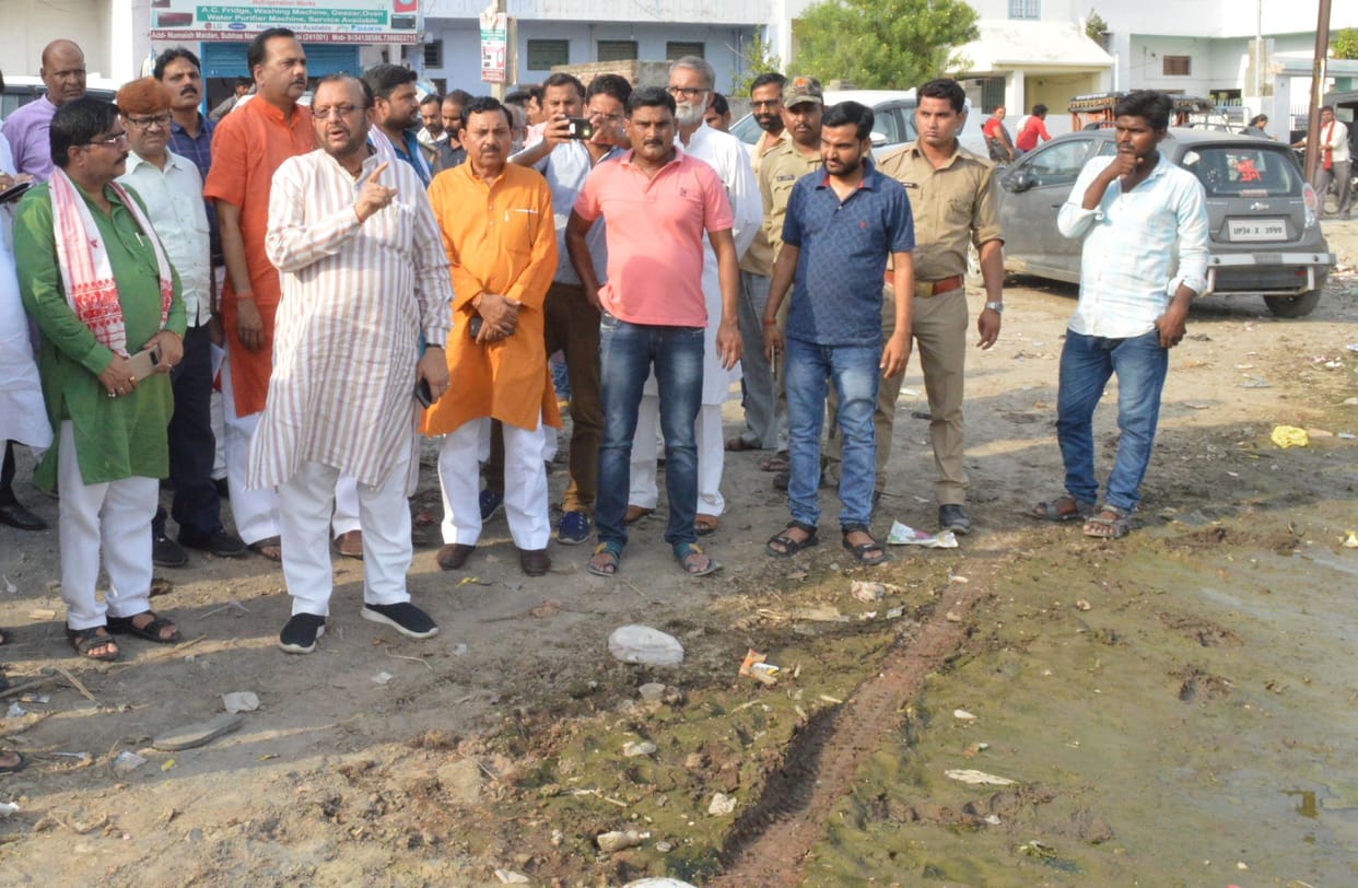 development minister angry after seing  water logging