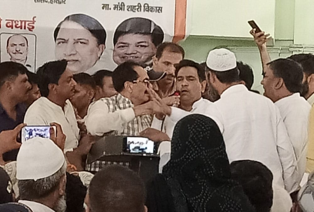 Ruckus and Scrimmage between congress mla and Haj Committee Chairman in piran kaliyar 
