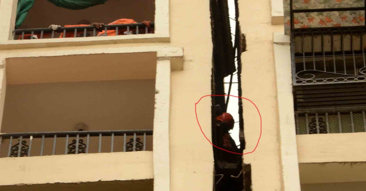 body of a missing domestic help found hanging between two towers