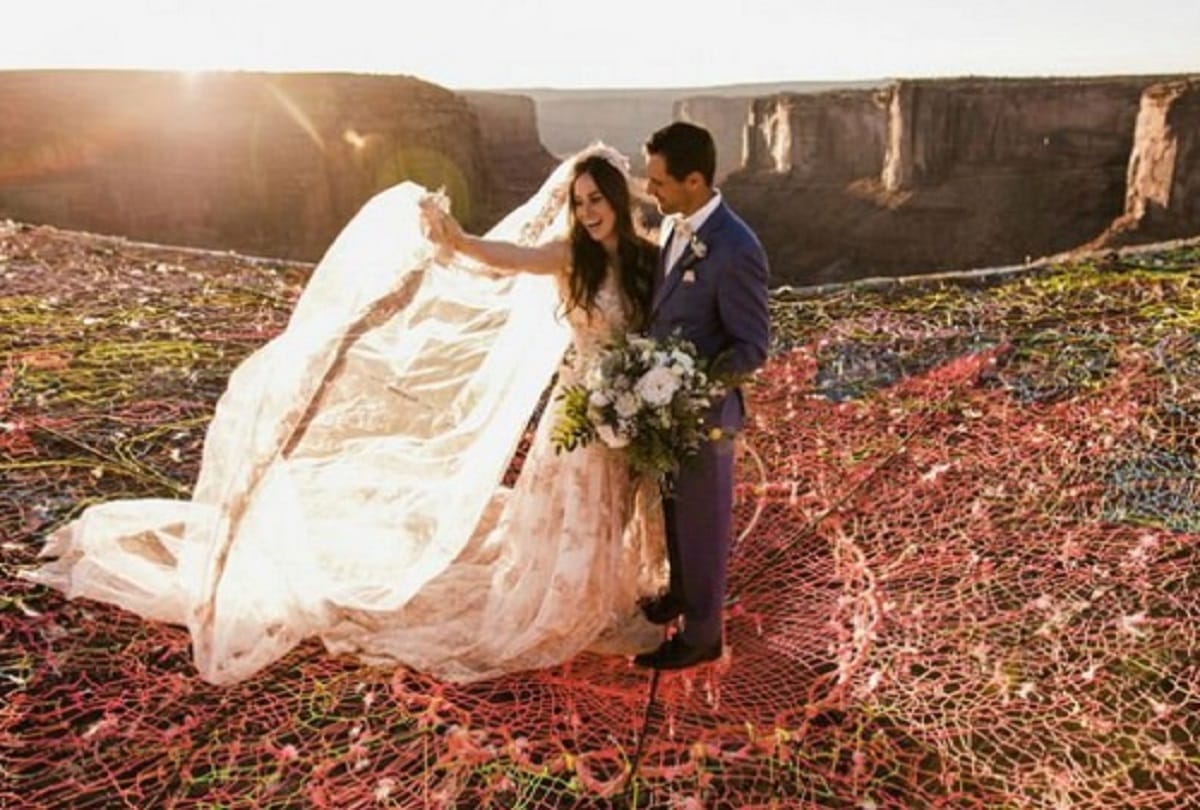 Weird marriages in the world Someone hanging in the air and someone got married inside the water